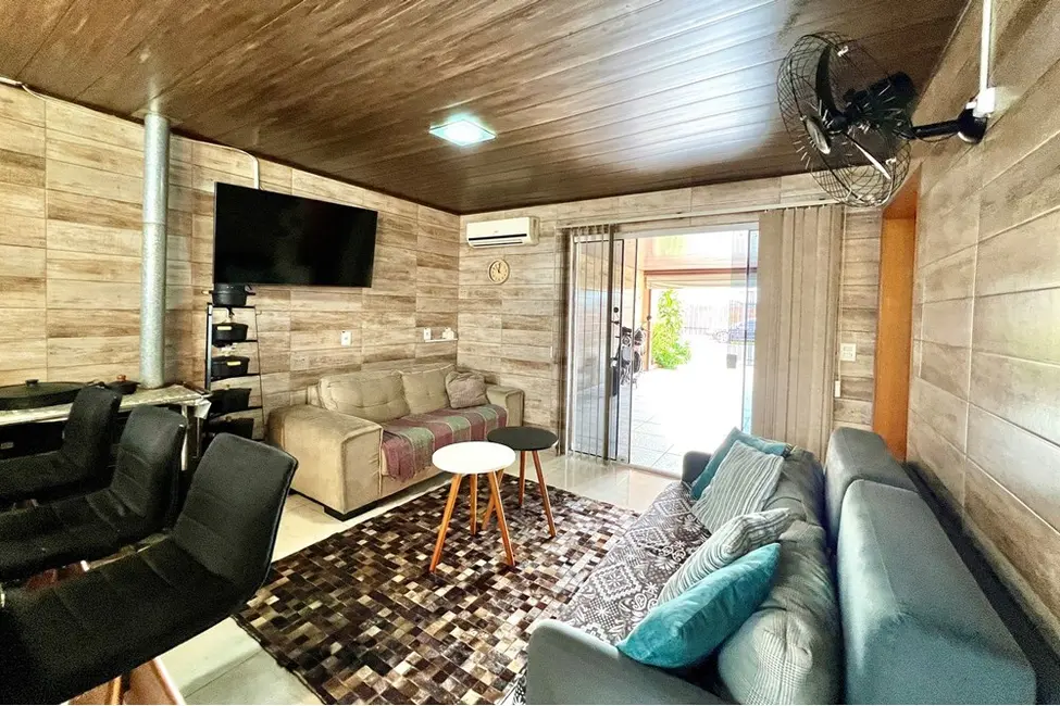 Casa com 4 quartos à venda, 200m2 em Estância Velha, Canoas - RS - imagem 5 Foto 5 de Casa com 4 quartos à venda, 200m2 em Estância Velha, Canoas - RS