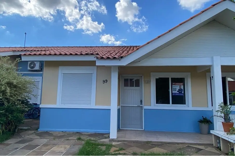 Casa com 3 quartos à venda, 72m2 em Estância Velha, Canoas - RS - imagem 5 Foto 5 de Casa com 3 quartos à venda, 72m2 em Estância Velha, Canoas - RS