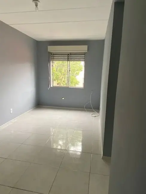 Foto 2 de Apartamento com 1 quarto à venda, 41m2 em Vila Nova, Porto Alegre - RS
