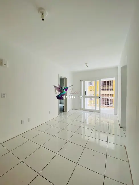 Foto 3 de Apartamento com 3 quartos à venda, 70m2 em Vila Nova, Porto Alegre - RS