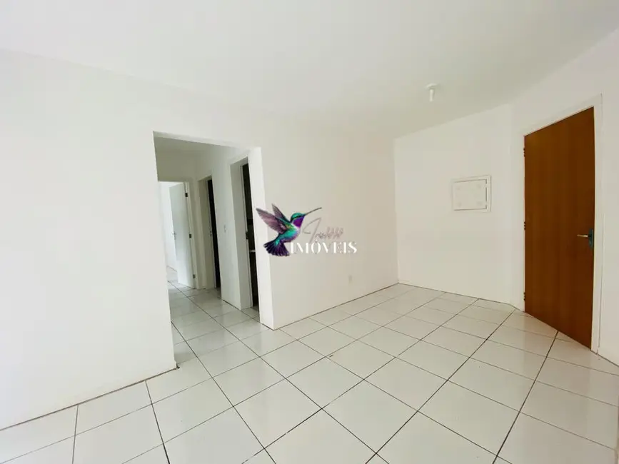 Foto 6 de Apartamento com 3 quartos à venda, 70m2 em Vila Nova, Porto Alegre - RS