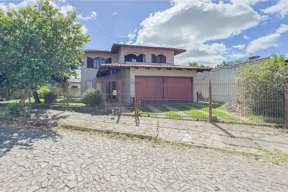 Casa com 5 quartos à venda, 208m2 em Porto Alegre - RS - imagem 1 Foto 1 de Casa com 5 quartos à venda, 208m2 em Porto Alegre - RS