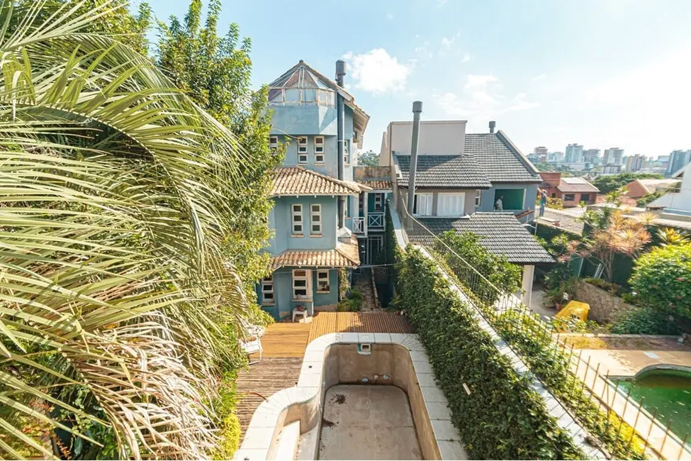 Casa com 4 quartos à venda, 410m2 em Chácara das Pedras, Porto Alegre - RS - imagem 8 Foto 8 de Casa com 4 quartos à venda, 410m2 em Chácara das Pedras, Porto Alegre - RS