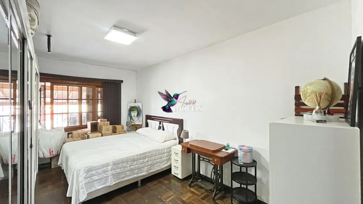 Foto 2 de Casa com 3 quartos à venda, 156m2 em Vila Nova, Porto Alegre - RS