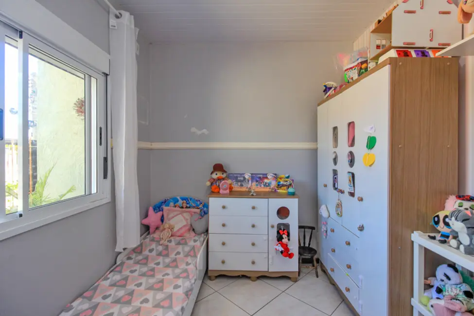 Foto 2 de Casa com 2 quartos à venda, 46m2 em Hípica, Porto Alegre - RS