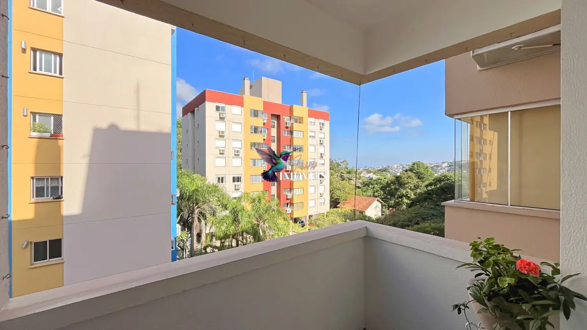 Foto 3 de Apartamento com 2 quartos à venda, 61m2 em Teresópolis, Porto Alegre - RS