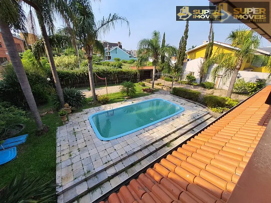 Foto 1 de Casa com 4 quartos à venda, 936m2 em Areal, Pelotas - RS