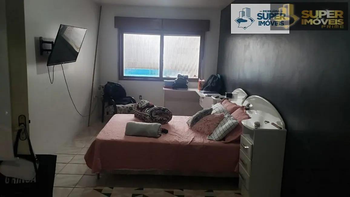 Casa com 4 quartos à venda, 235m2 em Centro, Pelotas - RS - imagem 6 Foto 6 de Casa com 4 quartos à venda, 235m2 em Centro, Pelotas - RS