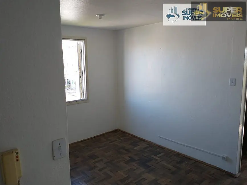 Foto 2 de Apartamento com 2 quartos à venda, 67m2 em Centro, Pelotas - RS