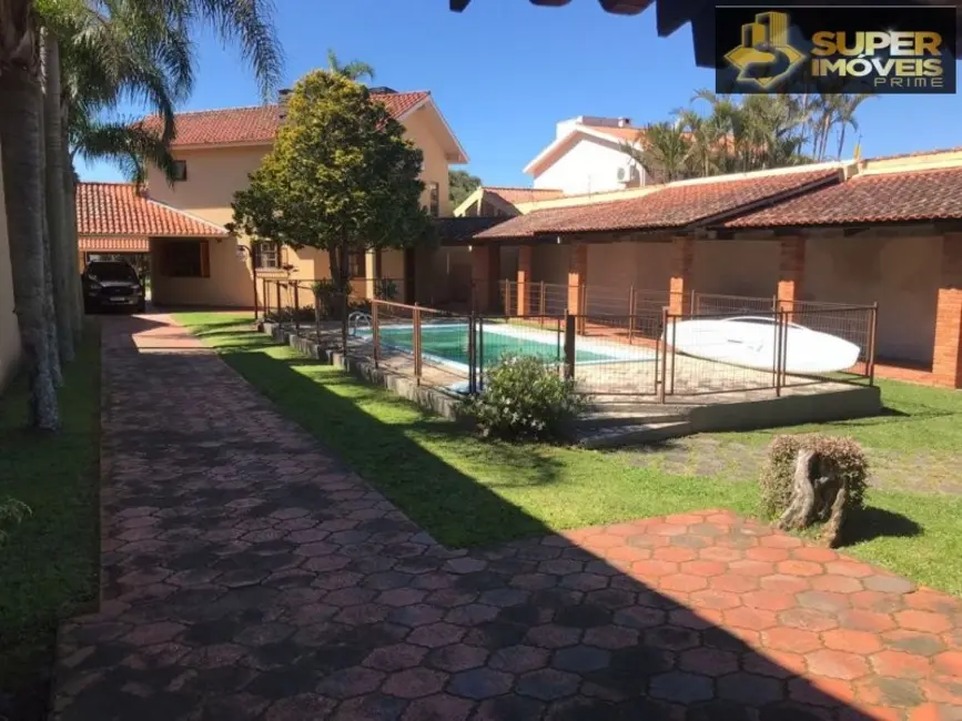 Foto 9 de Casa com 4 quartos à venda, 690m2 em Laranjal, Pelotas - RS