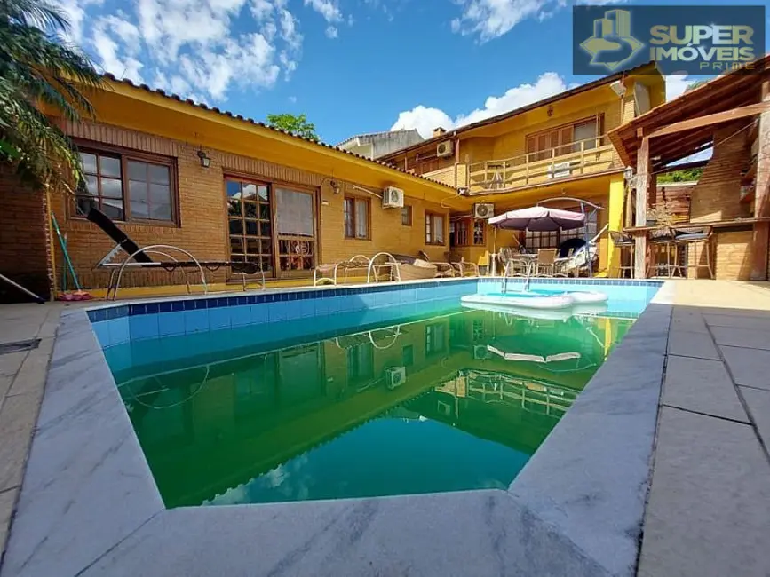 Casa com 4 quartos à venda, 360m2 em Centro, Pelotas - RS - imagem 1 Foto 1 de Casa com 4 quartos à venda, 360m2 em Centro, Pelotas - RS