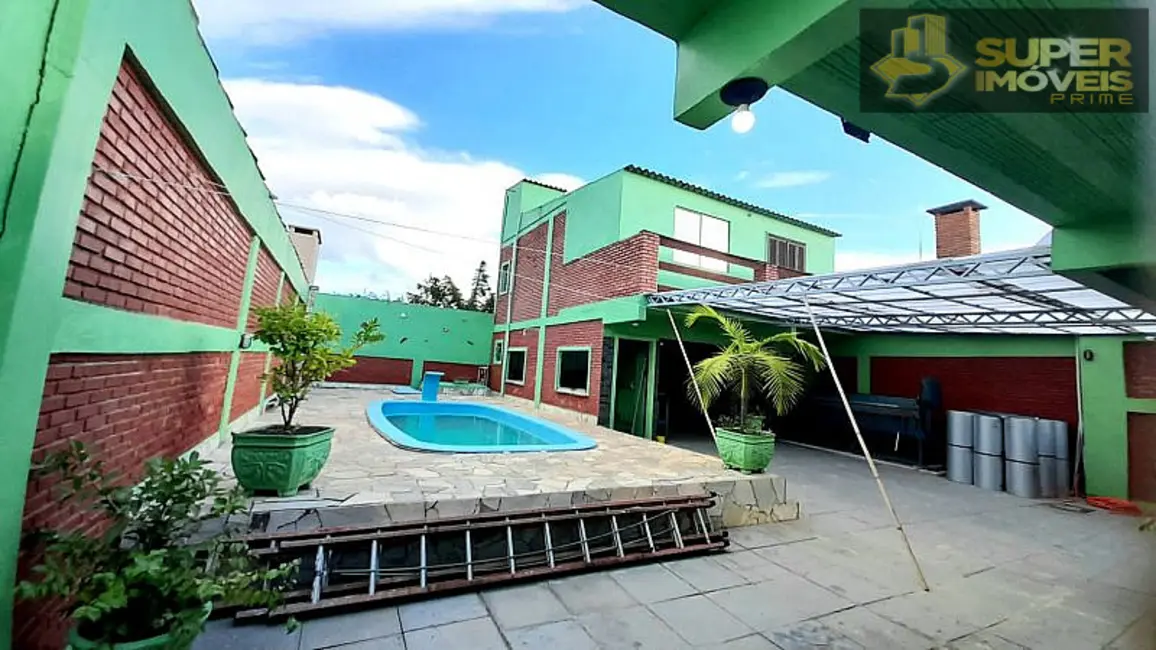 Foto 1 de Casa com 4 quartos à venda, 432m2 em Laranjal, Pelotas - RS