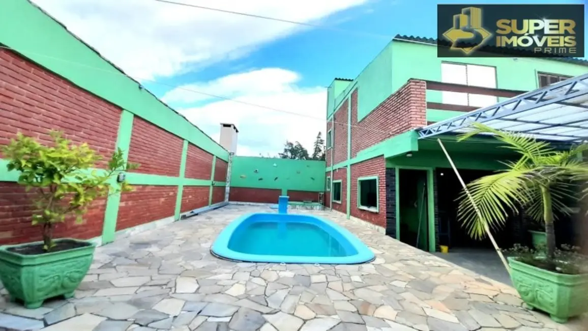 Foto 2 de Casa com 4 quartos à venda, 432m2 em Laranjal, Pelotas - RS