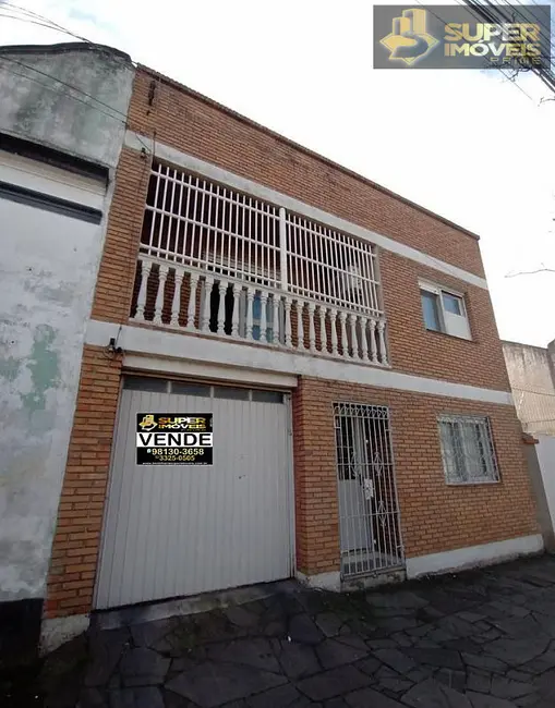 Casa com 4 quartos à venda, 202m2 em Centro, Pelotas - RS - imagem 1 Foto 1 de Casa com 4 quartos à venda, 202m2 em Centro, Pelotas - RS
