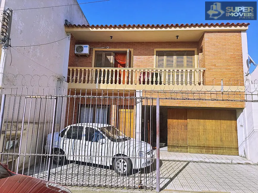 Casa com 4 quartos à venda, 391m2 em Centro, Pelotas - RS - imagem 1 Foto 1 de Casa com 4 quartos à venda, 391m2 em Centro, Pelotas - RS
