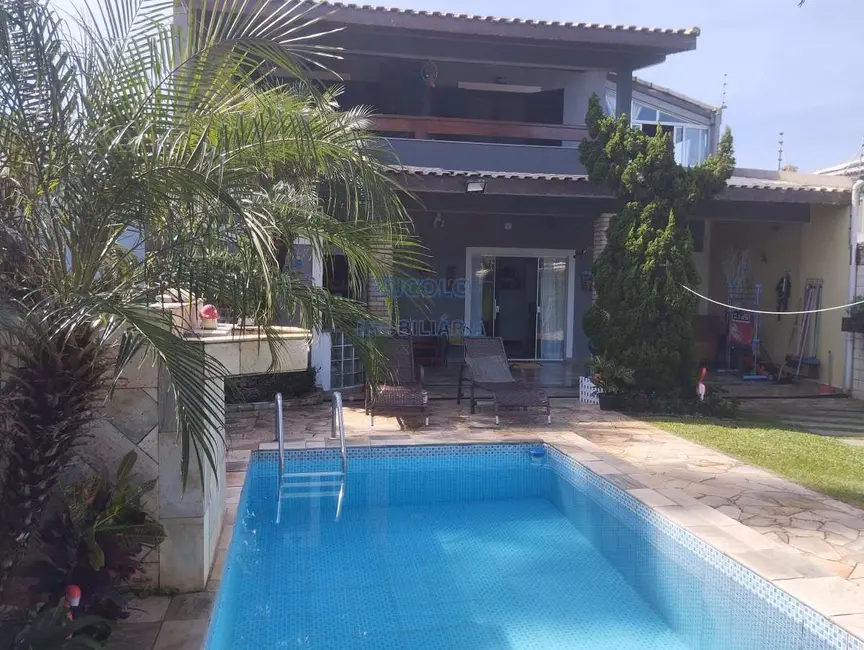 Foto 2 de Sobrado com 3 quartos à venda, 150m2 em Itanhaem - SP
