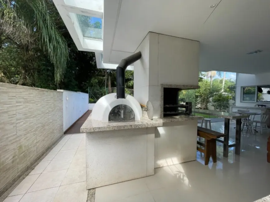 Foto 57 de Casa com 4 quartos para alugar, 400m2 em Jurerê, Florianopolis - SC