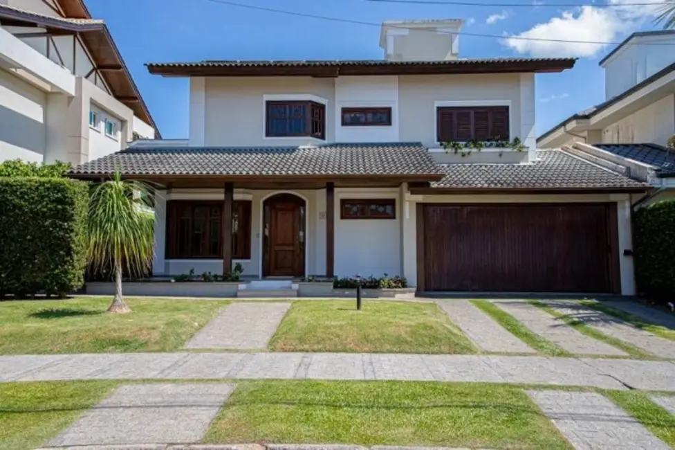 Foto 1 de Casa com 5 quartos para alugar, 280m2 em Jurerê Internacional, Florianopolis - SC