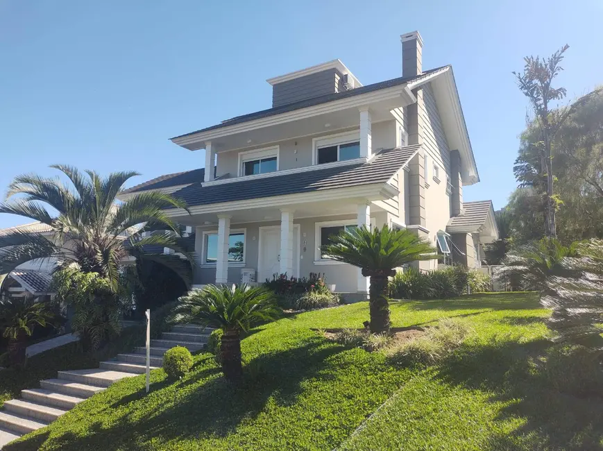 Foto 1 de Casa de Condomínio com 3 quartos à venda, 349m2 em Cacupé, Florianopolis - SC