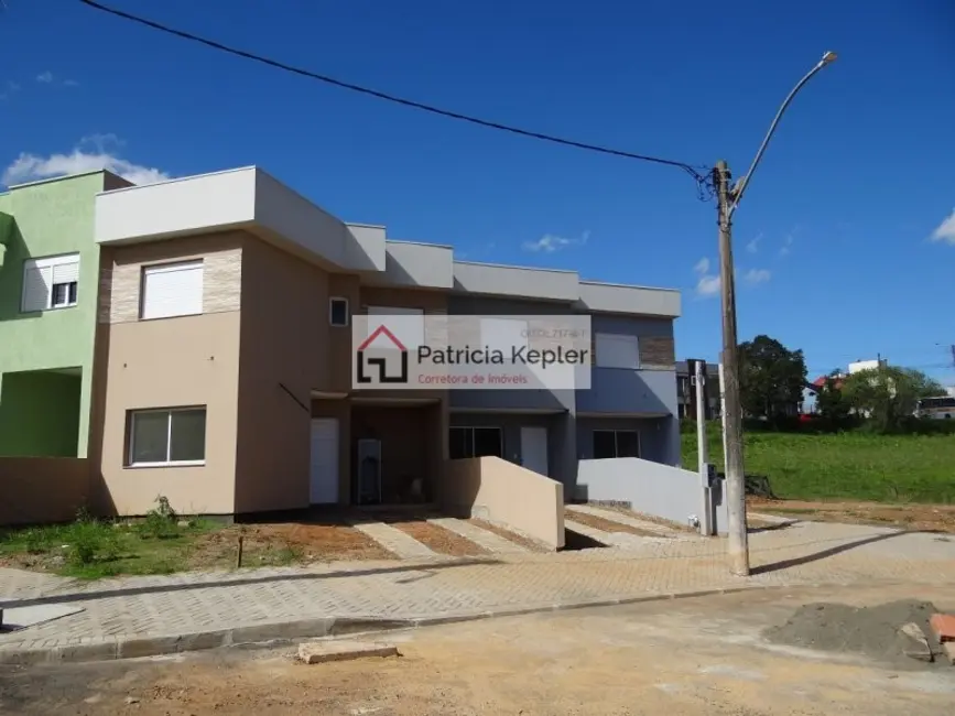 Foto 3 de Sobrado com 3 quartos à venda, 111m2 em Mário Quintana, Porto Alegre - RS