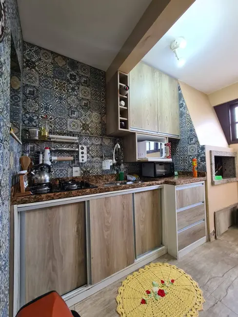 Casa com 3 quartos à venda, 110m2 em Centro, Xangri-lá - RS - imagem 3 Foto 3 de Casa com 3 quartos à venda, 110m2 em Centro, Xangri-lá - RS