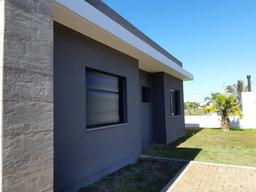 Foto 4 de Casa com 4 quartos à venda, 204m2 em Xangri-lá - RS