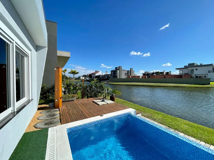 Foto 9 de Casa com 4 quartos à venda em Xangri-lá - RS