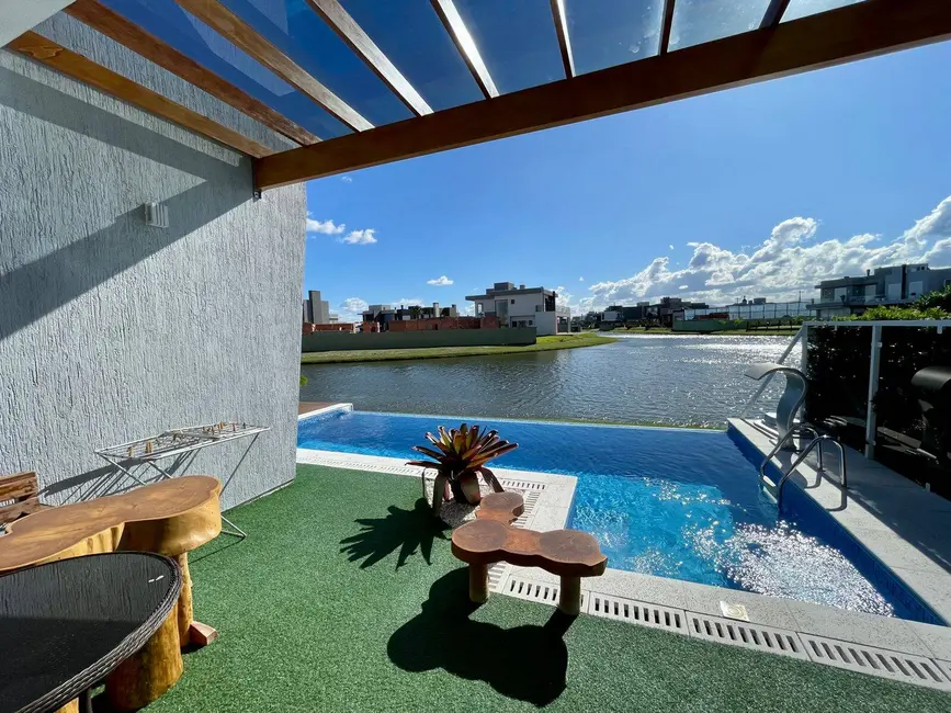 Foto 8 de Casa com 4 quartos à venda em Xangri-lá - RS