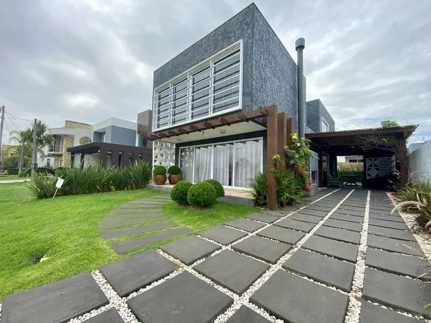 Casa com 3 quartos à venda em Xangri-lá - RS - imagem 1 Foto 1 de Casa com 3 quartos à venda em Xangri-lá - RS