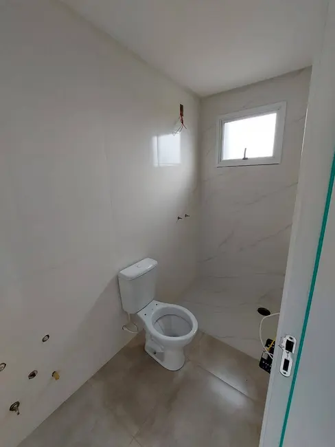 Casa com 2 quartos à venda, 100m2 em Centro, Xangri-lá - RS - imagem 6 Foto 6 de Casa com 2 quartos à venda, 100m2 em Centro, Xangri-lá - RS