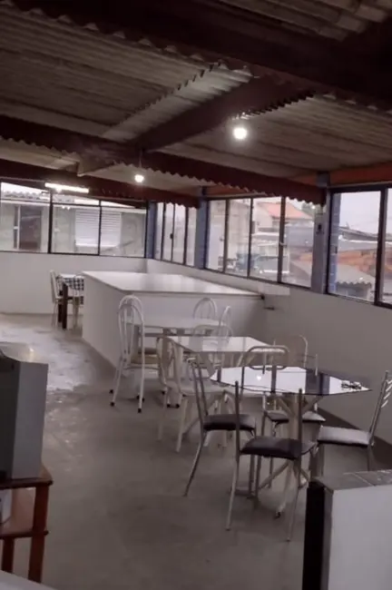 Foto 2 de Casa com 4 quartos à venda, 175m2 em Nova Mirim, Praia Grande - SP