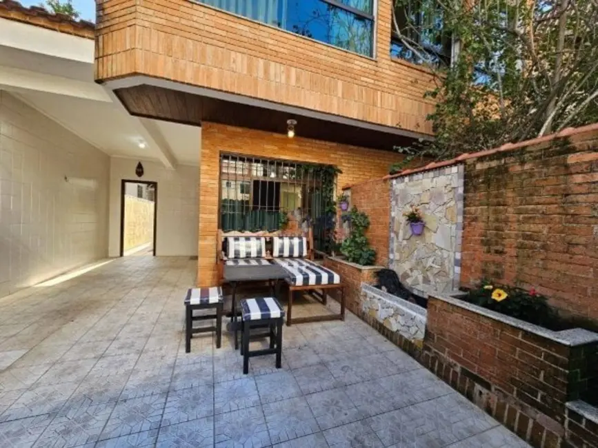 Foto 1 de Casa com 4 quartos à venda, 150m2 em Embaré, Santos - SP