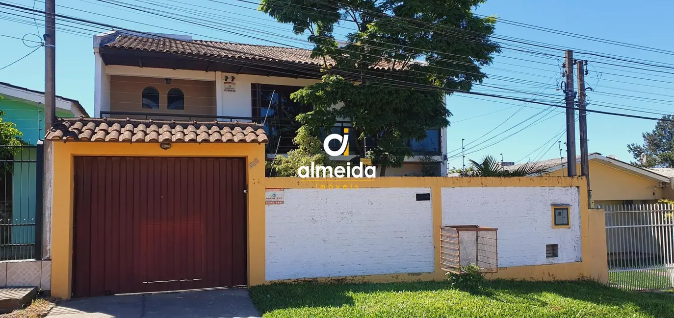 Foto 1 de Casa com 4 quartos à venda, 259m2 em Pinheiro Machado, Santa Maria - RS