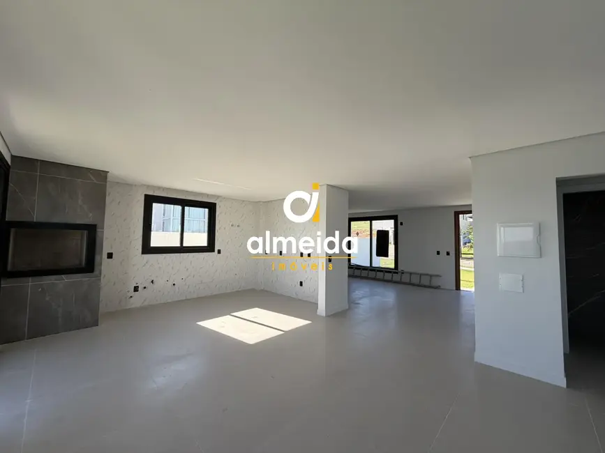 Foto 6 de Casa de Condomínio com 3 quartos à venda, 200m2 em Tomazetti, Santa Maria - RS