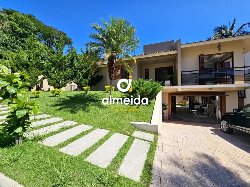 Foto 3 de Casa de Condomínio com 4 quartos à venda, 315m2 em Nossa Senhora do Perpétuo Socorro, Santa Maria - RS