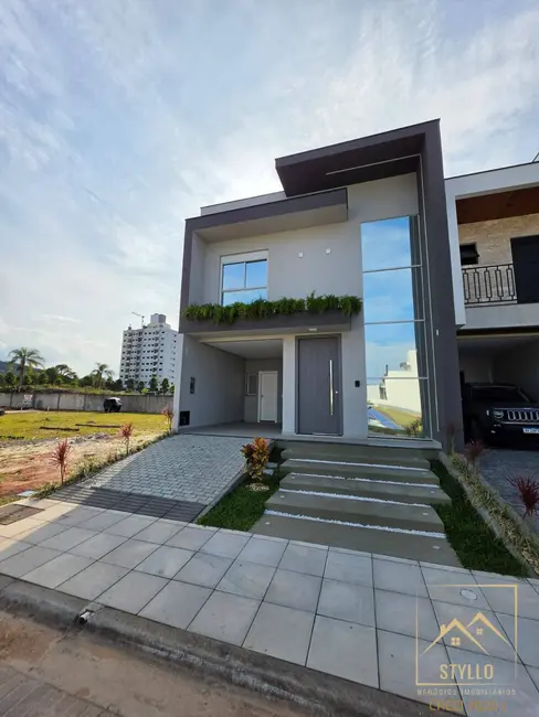 Casa de Condomínio com 3 quartos à venda, 144m2 em Beira Rio, Biguacu - SC - imagem 1 Foto 1 de Casa de Condomínio com 3 quartos à venda, 144m2 em Beira Rio, Biguacu - SC