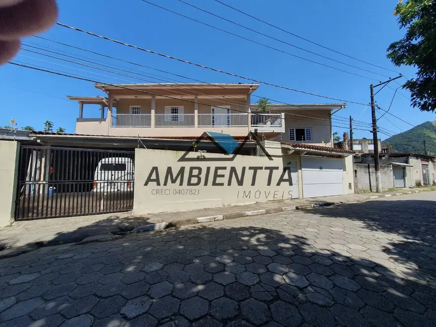 Foto 1 de Sobrado com 5 quartos à venda em Martim de Sá, Caraguatatuba - SP