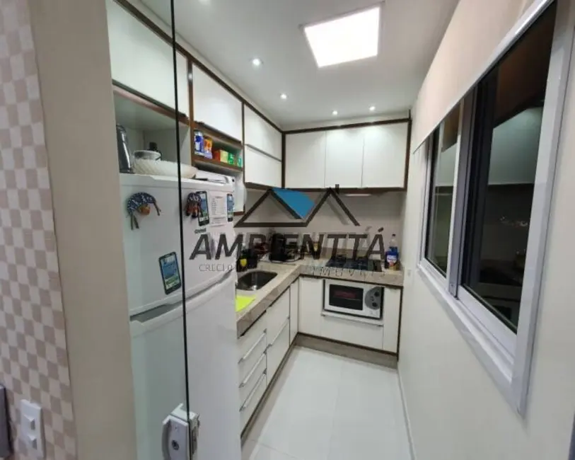 Foto 2 de Apartamento com 2 quartos à venda, 67m2 em Indaiá, Caraguatatuba - SP