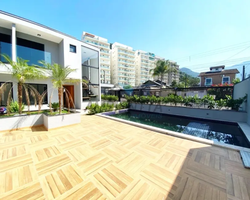 Foto 4 de Sobrado com 3 quartos à venda, 111m2 em Cidade Jardim, Caraguatatuba - SP