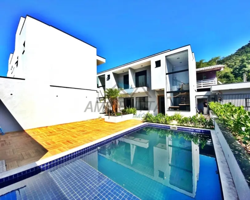 Foto 3 de Sobrado com 3 quartos à venda, 111m2 em Cidade Jardim, Caraguatatuba - SP