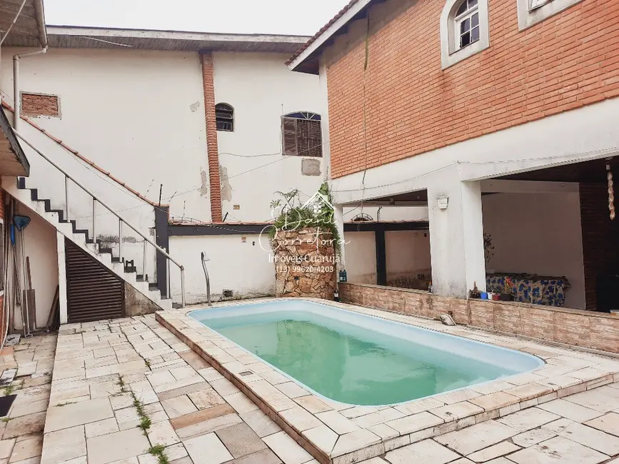 Foto 2 de Casa com 6 quartos à venda e para alugar, 298m2 em Vila Santa Rosa, Guaruja - SP