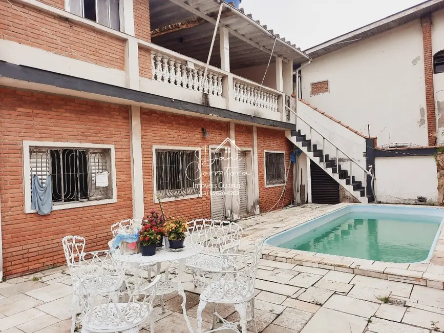 Foto 1 de Casa com 6 quartos à venda e para alugar, 298m2 em Vila Santa Rosa, Guaruja - SP