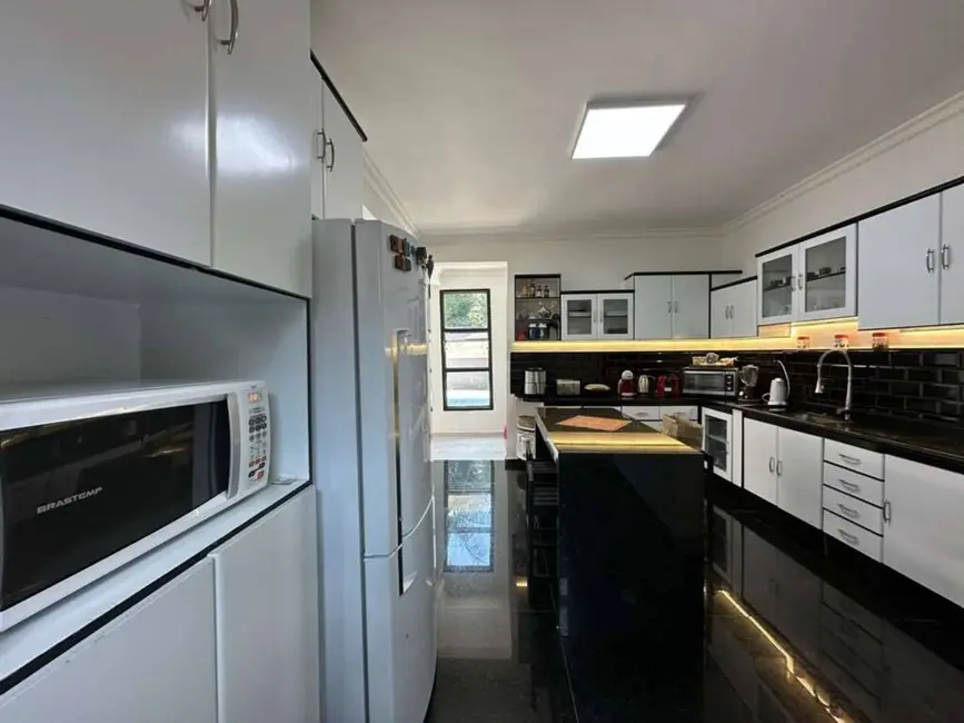 Foto 7 de Casa de Condomínio com 3 quartos à venda, 460m2 em Jardim do Golf I, Jandira - SP