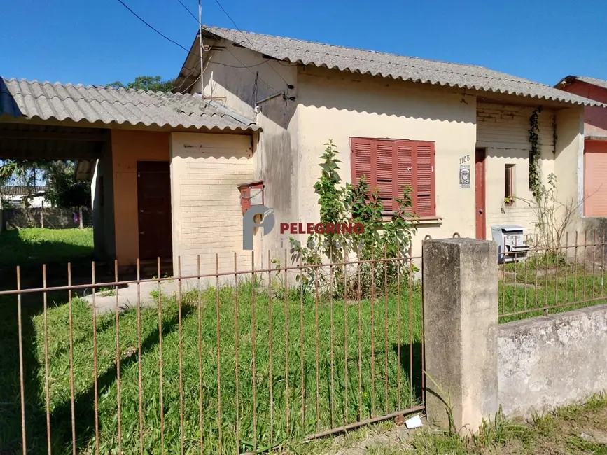 Foto 1 de Casa com 4 quartos à venda, 98m2 em Centro, Tapes - RS