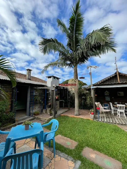 Foto 1 de Casa com 4 quartos à venda, 246m2 em Centro, Tapes - RS
