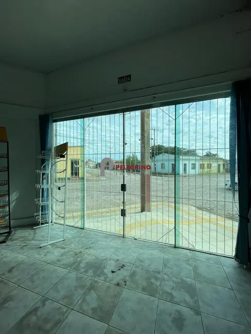 Foto 2 de Prédio Inteiro com 3 quartos para alugar, 612m2 em Centro, Tapes - RS