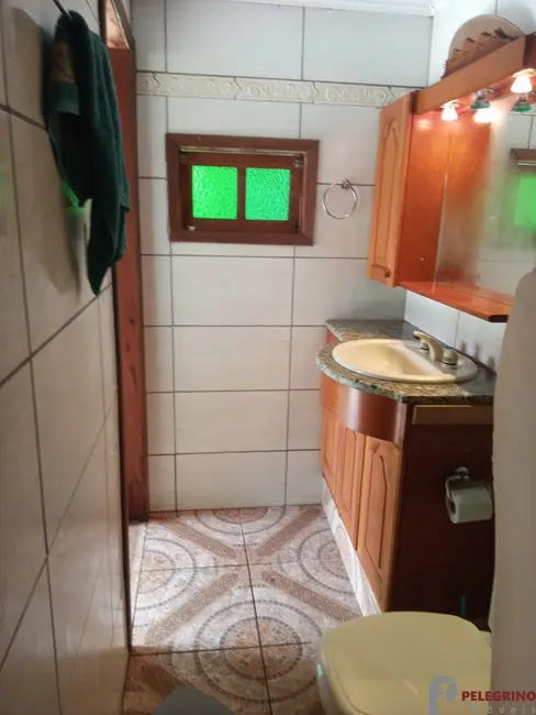 Foto 18 de Casa com 2 quartos à venda, 64m2 em Tramandai - RS
