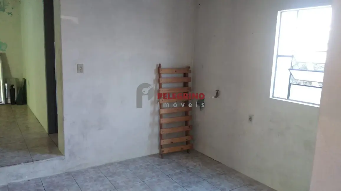 Foto 1 de Casa com 3 quartos à venda, 130m2 em Centro, Tapes - RS