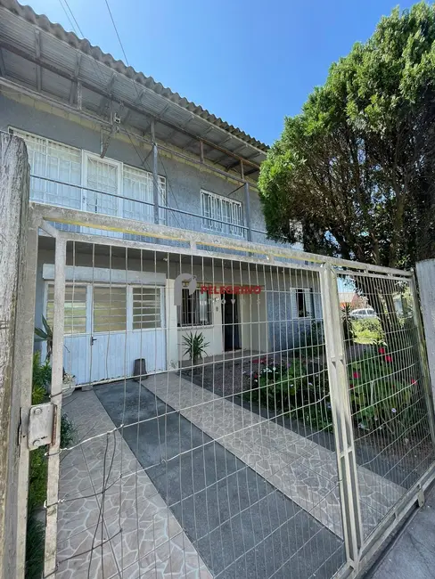 Foto 1 de Casa com 4 quartos à venda, 176m2 em Tapes - RS
