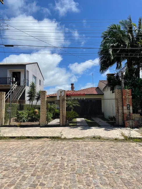Foto 1 de Casa com 2 quartos à venda, 108m2 em Centro, Tapes - RS